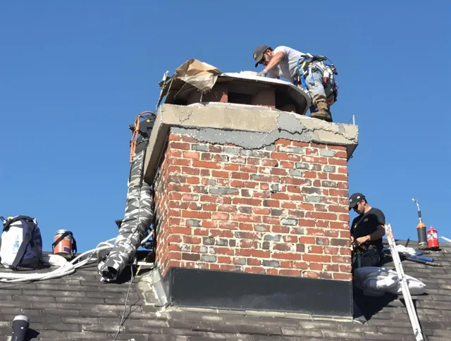 Burbank Chimney Sweep installing a custom chimney crown in Burbank, CA