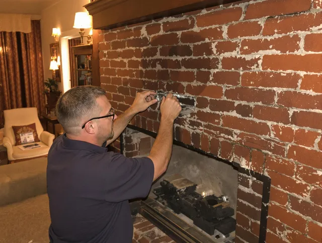 Burbank Chimney Sweep expert fixing a fireplace in Burbank, CA